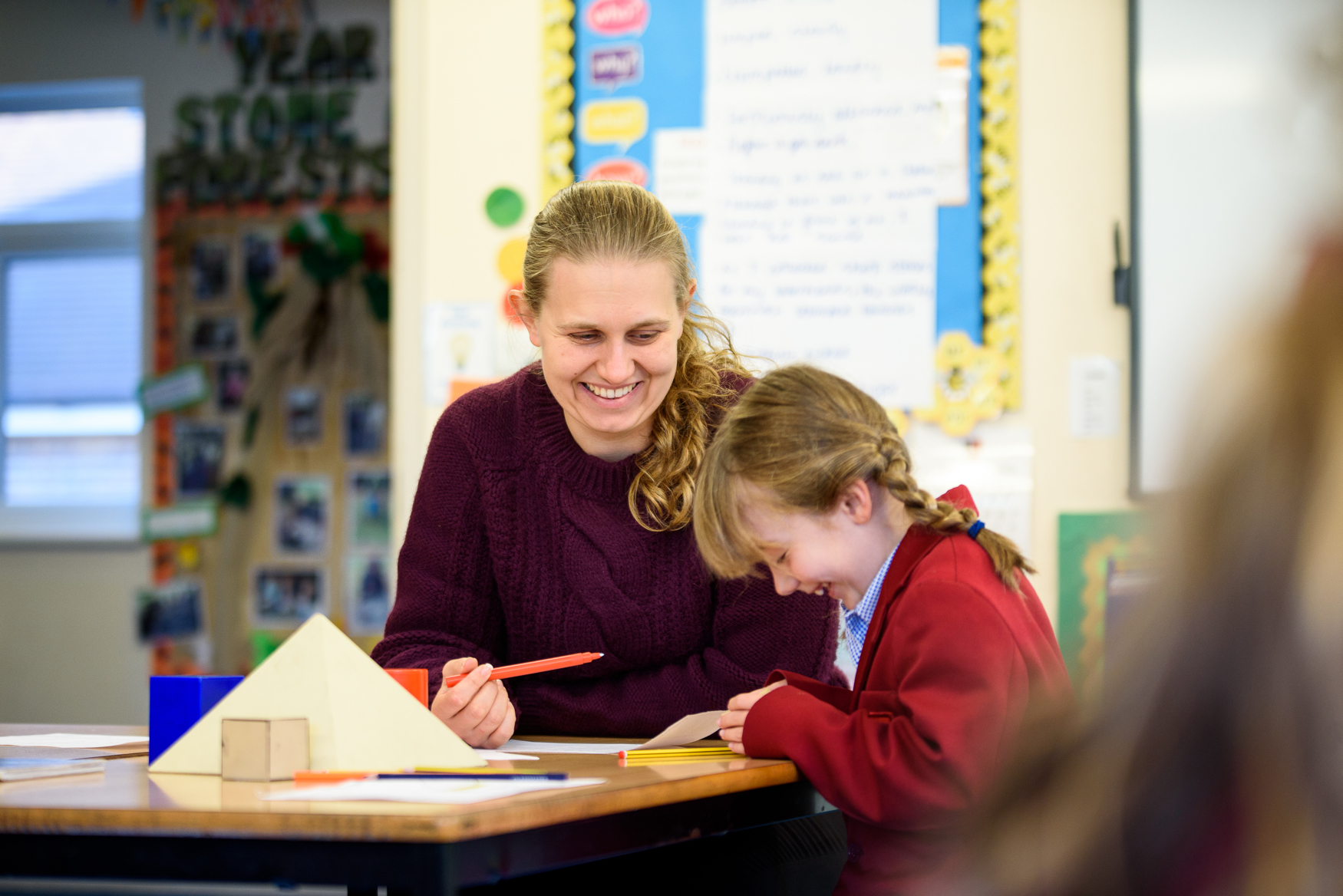 Lingfield College Prep school teacher writing with student