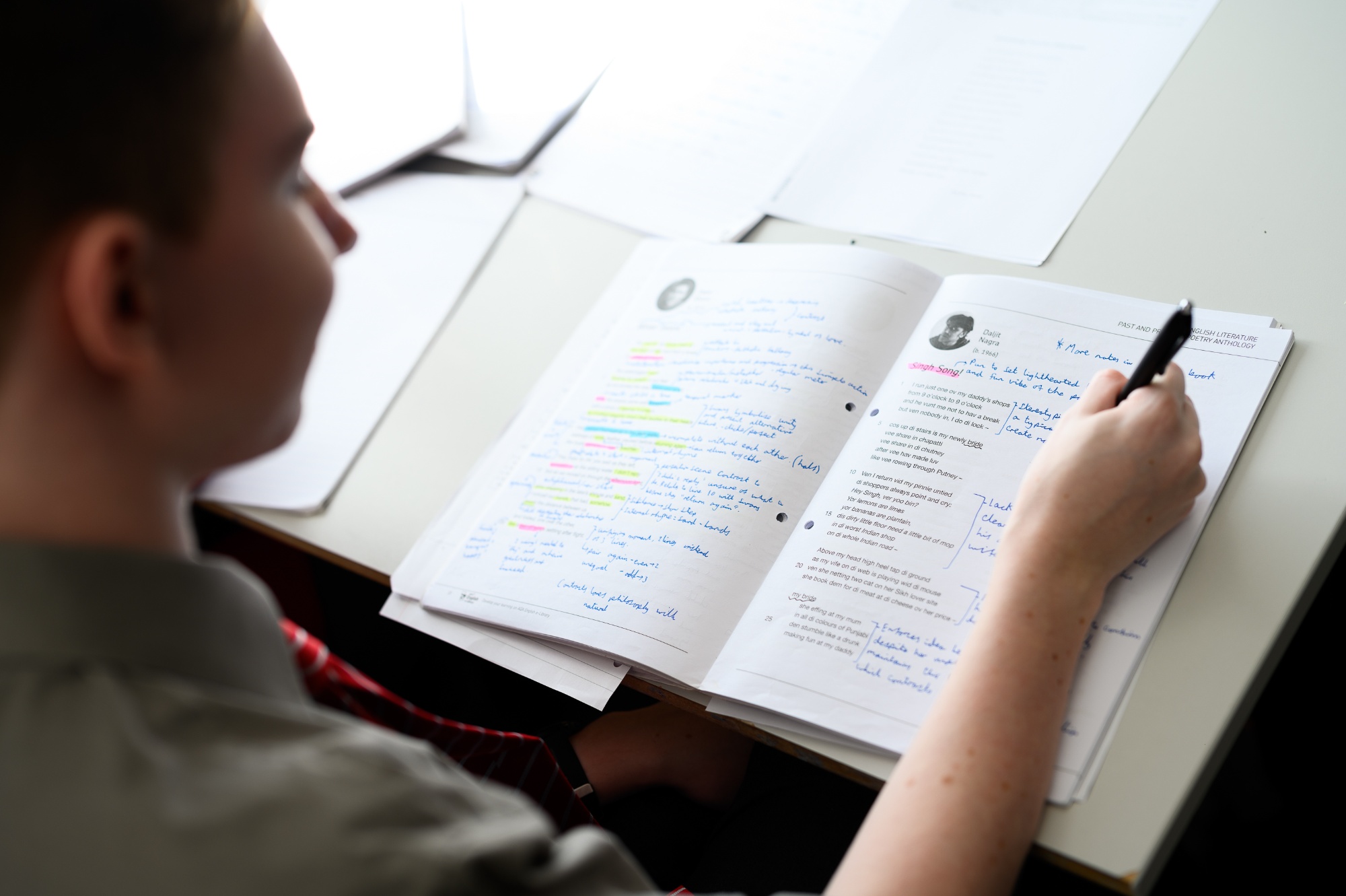 Student annotating poem