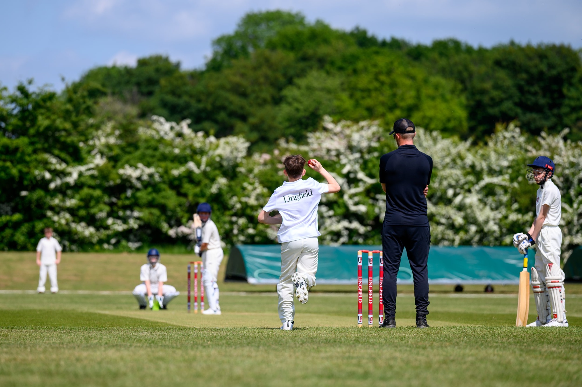 Lingfield student bowling in a cricket match