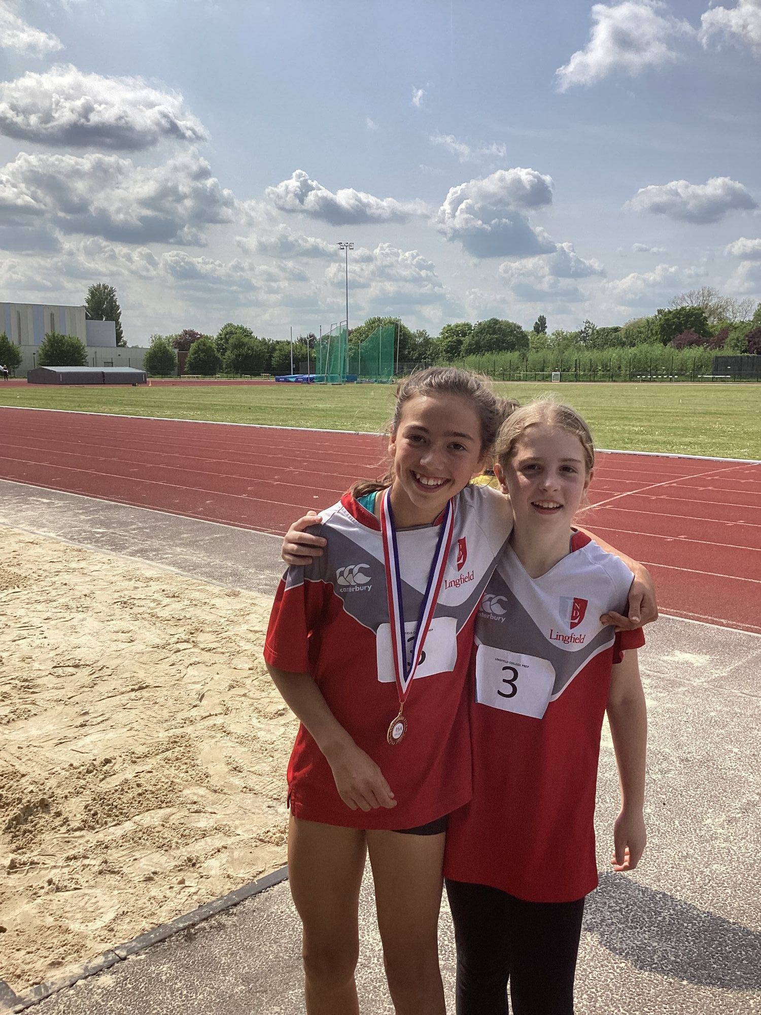 Gold medallists Ella and Emily at ISA Regional Athletics