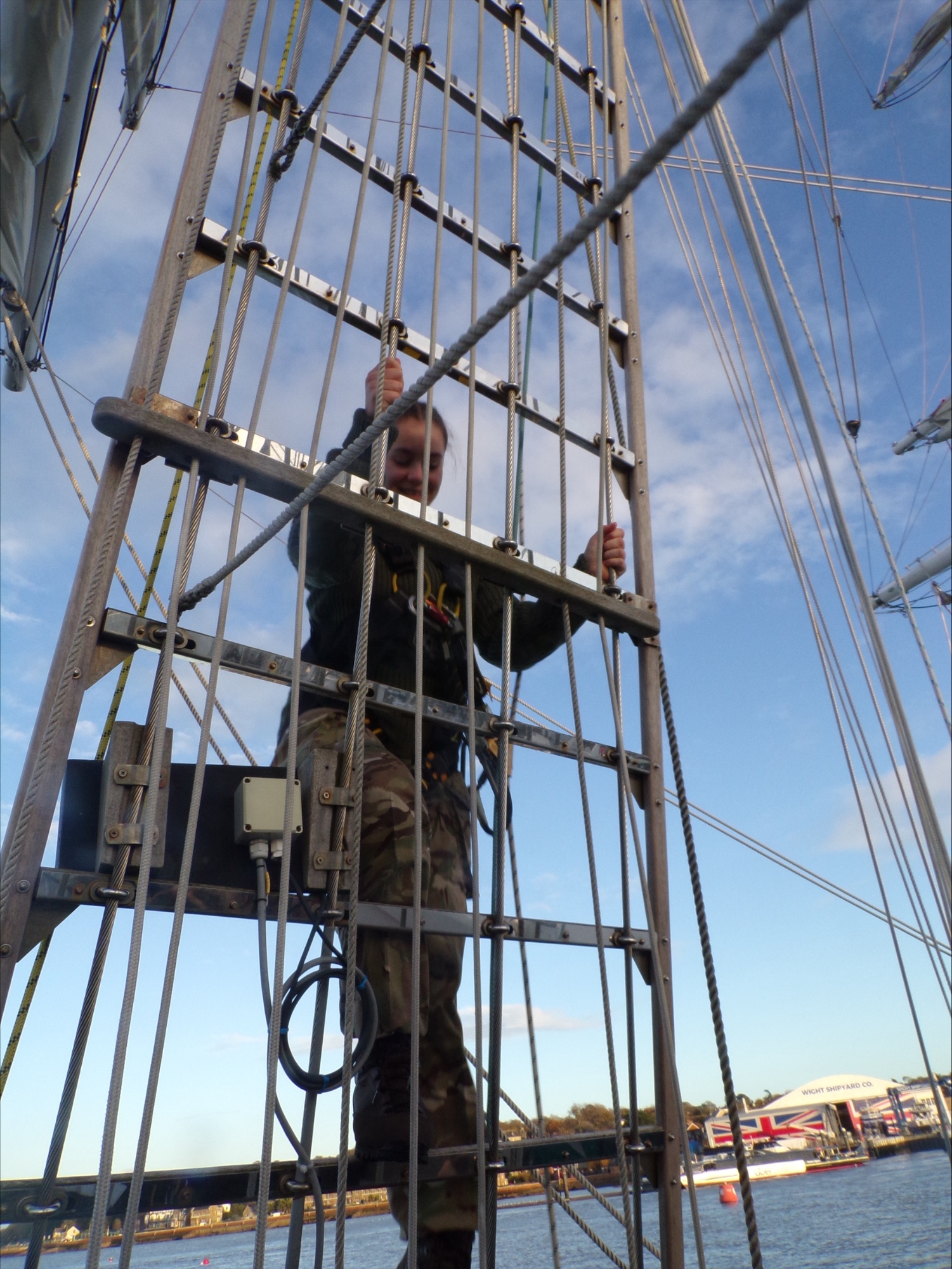 Lingfield student Sophie climbing the rigging on TS Royalist