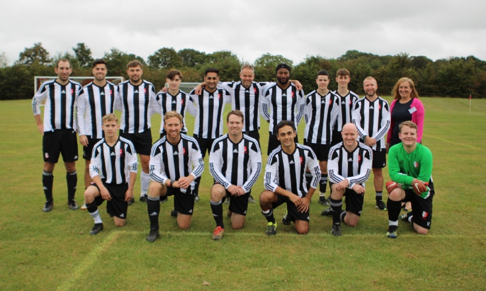 Alumni football team 2023 with Mr Harrison and Mrs Roe